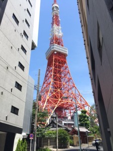 Tokyo Tower: The grandeur of the modern Tokyo Tower juxtaposed with the architecture of old Tokyo. - Rony Ballouz