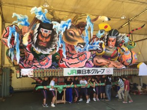 On three, heave!: One of the many giant, colorful Nebuta Matsuri floats, made by hand every year, that Aomori is most famous for. ~ Haihao Liu
