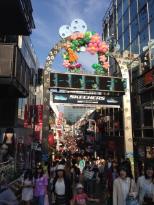 Takeshita Street: This weekend I visited Harajuku and got to see the bustling shops and restaurants on Takeshita street. It might be hard to see, but that’s me on the screen! - Chandni Rana