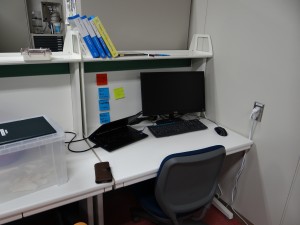 My new workspace fitted with a brand new laptop, monitor, textbooks, and more. - Donald Swen