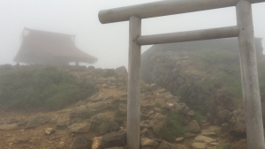 The entire top of the mountain had been enveloped by a large cloud while I was up there. As a walked along the peak, this shrine suddenly emerged from the fog. Extremely quiet and completely surrounded by fog, this shrine stood in a very unique environment. ~ Youssef Tobah